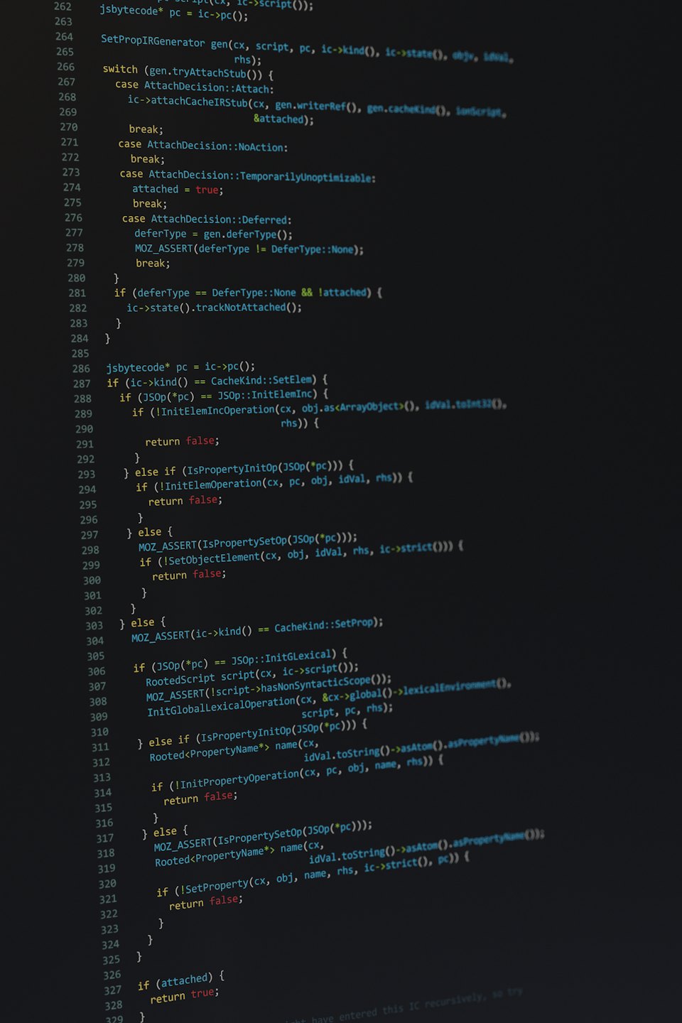 Lines of colorful source code displayed in a dark text editor.
